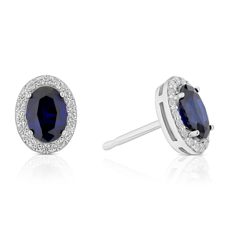 Main Image 1 of Sterling Silver Platinum Plated Blue Oval Cut Cubic Zirconia Stud Earrings